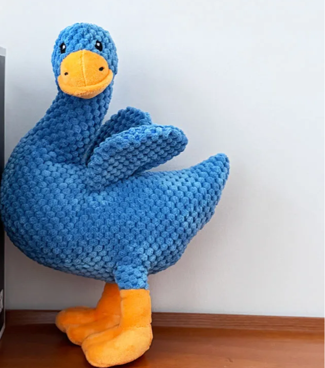 SnuggleDuck™ – The Calming Squeaky Chew Buddy